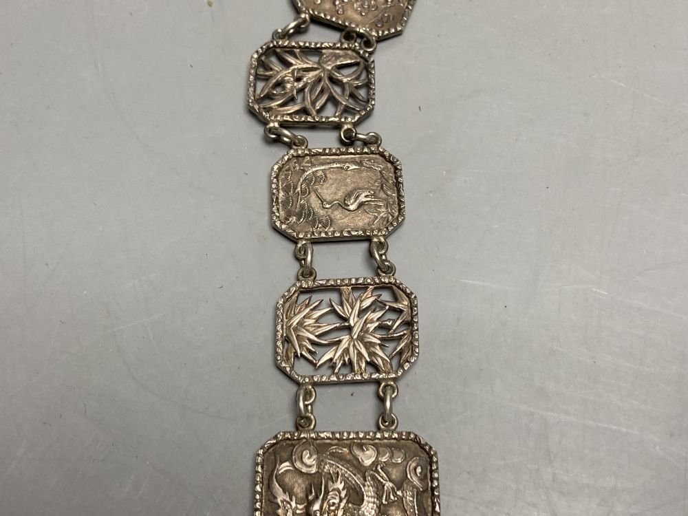 An early 20th century Chinese Export white metal belt by Wang Hing, Hong Kong and other items.